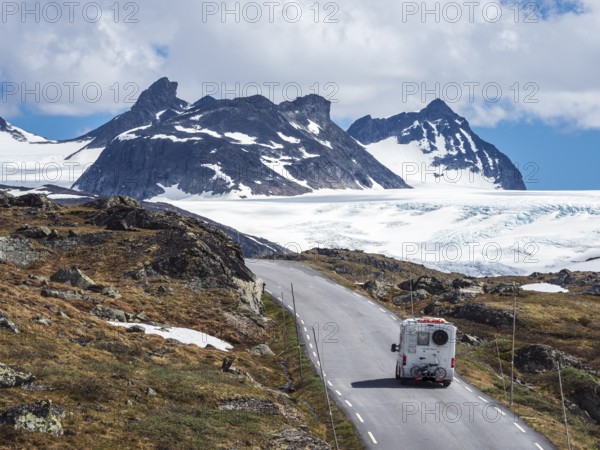 Camper van, mountain crossing Sognefjellsvegen, view towards glacier, mountain pass over the Sognefjellet, Norway, Europe