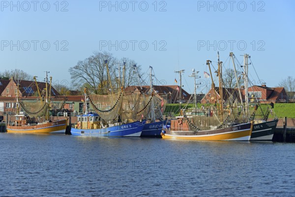 Crab cutter in the harbour of Greetsiel, blue sky, North Sea, Lower Saxony, Germany, Europe