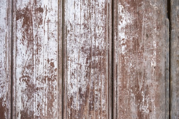 Old wooden door with peeling paint, texture, background, Apulia, Italy, Europe