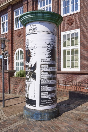 Advertising pillar with advertisement of the Stadeum at the Bahnhofstrasse in the city centre of Stade, Hanseatic city, district of Stade, Lower Saxony, Germany, Europe