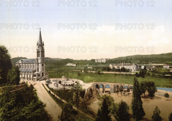 The Basilica of the Assumption is a Roman Catholic church and minor basilica in the French Marian pilgrimage town of Lourdes. It is part of the sacred precinct where the Virgin Mary allegedly appeared to Bernadette Soubirous in 1858, France, ca 1890, Historical, digitally restored reproduction from a 19th century original, Record date not stated, Europe