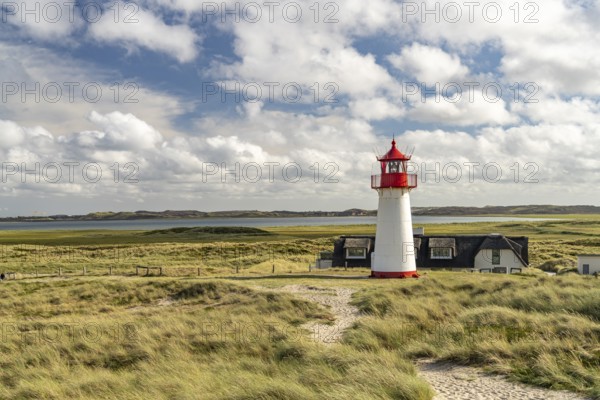 The List West lighthouse on the coast of the Ellenbogen peninsula, List, island of Sylt, district of North Friesland, Schleswig-Holstein, Germany, Europe