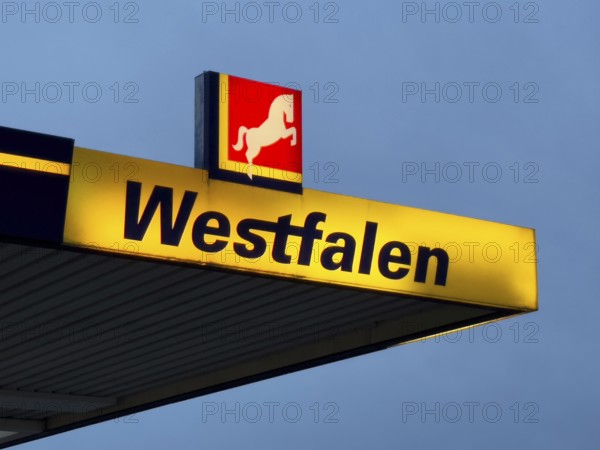 Logo with Westphalian horse and lettering Westfalen on petrol station of chain of petrol stations brand Westfalentankstelle, North Rhine-Westphalia, Germany, Europe