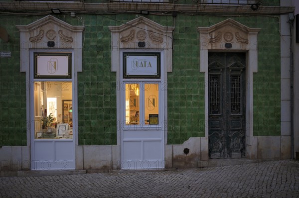 Green house with azulejos, tiles, square Praça Luís de Camões, old town, Lagos, evening mood, Algarve, Portugal, Europe