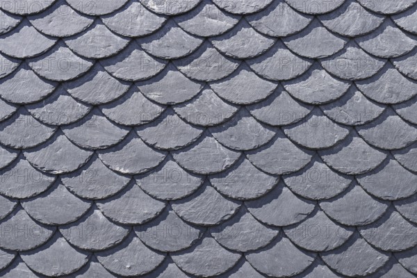 Facade clad with natural slate, covering with special fish scales, Wilnsdorf. North Rhine-Westphalia, Germany, Europe