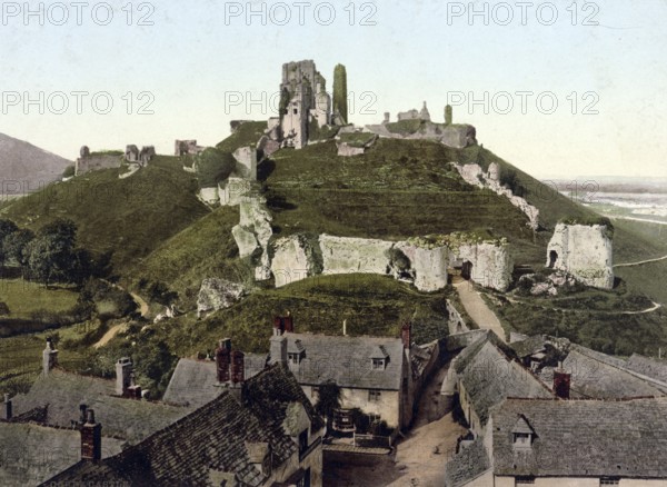 Corfe Castle is the ruins of a castle in the English village of Corfe Castle in the county of Dorset, England, around 1890, Historical, digitally restored reproduction from a 19th century original