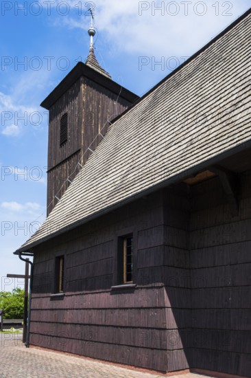 Cemetery and All Saints' Church, a historic traditional timber-frame church, which in its present form dates back to 1599, in Gross Lassowitz, Polish: Lasowice Wielkie, Powiat Kluczborski, Opole Voivodeship, Poland, Europe