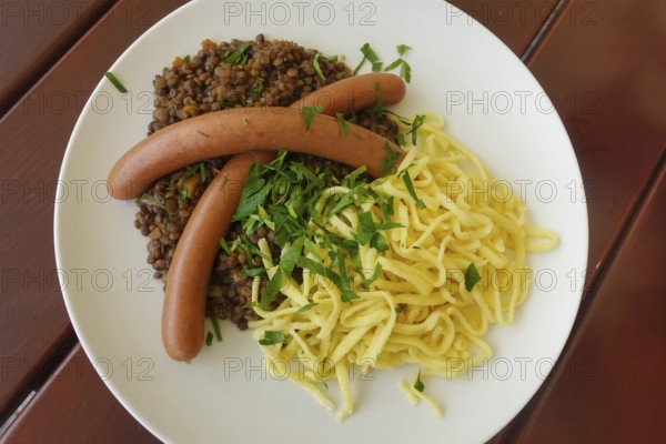 Swabian cuisine, traditional cuisine, home cooking, typical Swabian, hearty, lentils with spaetzle and string sausages, Königliche Post restaurant, restaurant, food photography, old camp, former military area, biosphere area, Münsingen, Swabian Alb, Baden-Württemberg, Germany, Europe