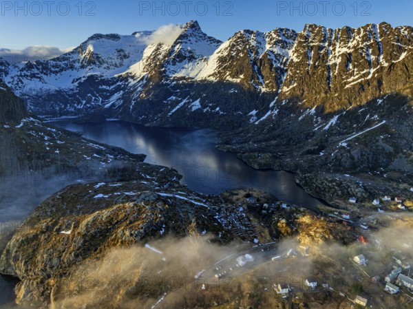 Aerial view, village, steep mountains, coast, winter, fog, evening light, A i Lofoten, Moskenesoya, Lofoten, Norway, Europe