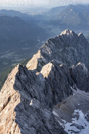 Steep rocky ridge in the evening light, Waxensteinkamm, with summit Waxenstein, view from the summit of the Zugspitze, Wetterstein range, Bavaria, Germany, Europe