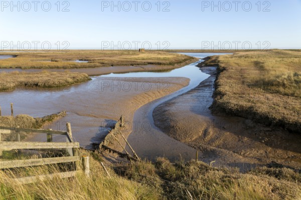 Landscape mudfats saltings tributary of River Ore low tide, Orford Ness spit, North Sea, Suffolk, England, Uk