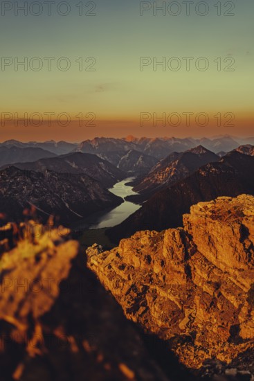 Thaneller summit at sunset in the Lechtal valley in Tyrol with a wonderful view of the surrounding mountains. Tyrol, Austria, Europe