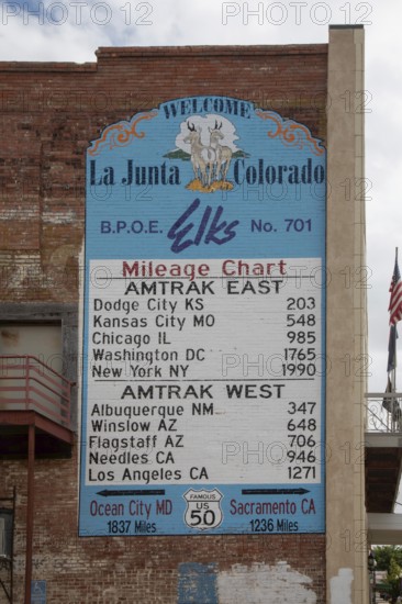 La Junta, Colorado, A chart on the outside of the Elks Lodge near the Amtrak station lists train mileage to destinations east and west