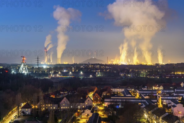 UNIPER coal-fired power plant Gelsenkirchen-Scholven, power plant units and cooling towers, headframe of the former Hugo coal mine, shaft 2, Scholven slagheap with 2 wind turbines, on the right Ruhr Öl GmbH, BP Gelsenkirchen, refinery, in the foreground the district of Gelsenkirchen-Buer, North Rhine-Westphalia, Germany, Europe