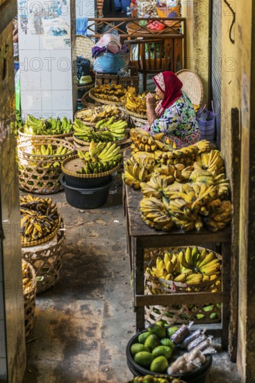 Traditional authentic food market, vendor, woman, fruit, vegetable, fresh, food, nutrition, sale, trade, bazaar, authentic, disease vector, food law, food control, stall, Asian, vegetable market, local, hygiene, virus, tradition, traditional, health, marketplace, market hall, tropical, travel, tourism, culture, poverty, presentation, cleanliness, person, Muslim, Islam, Lombok, Indonesia, Asia