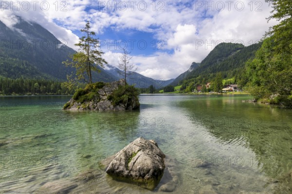 Hintersee near Ramsau with clear green water, surrounded by forests and mountains under a cloudy sky, Berchtesgaden National Park, Berchtesgadener Land, Upper Bavaria, Bavaria, Germany, Europe