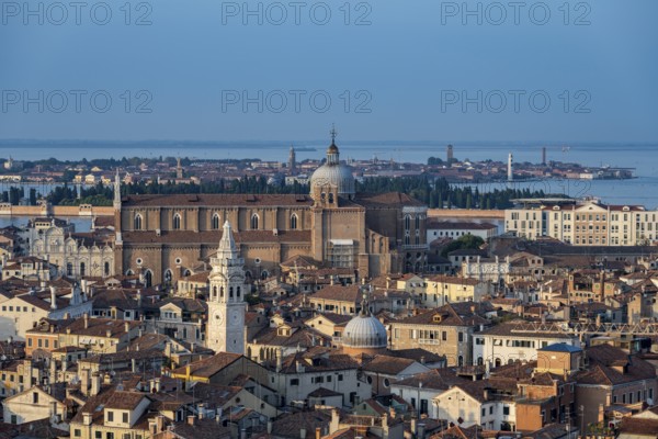 View over the roofs of Venice to the church Basilica dei Santi Giovanni e Paolo in the evening light, view from the bell tower Campanile di San Marco, city view of Venice, Veneto, Italy, Europe