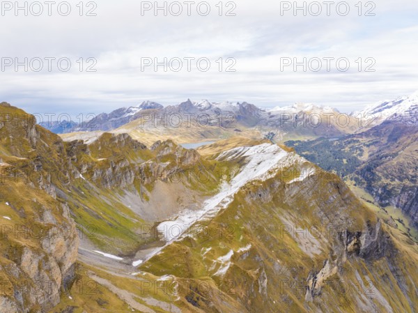 Dramatic view of a rocky mountain landscape with snowfields and valleys, Alpentower, Switzerland, Europe