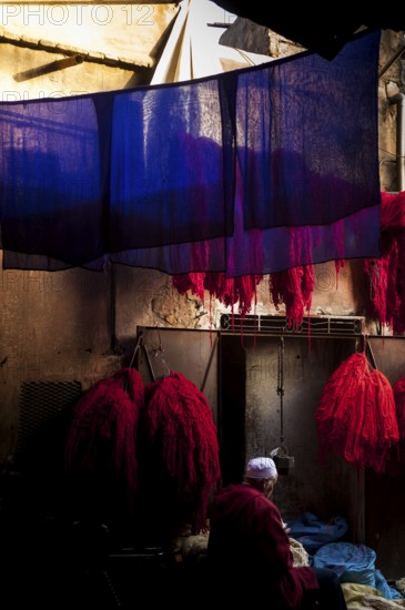 Wool for drying in the dyer's souk, dyer, colours, red, blue, complementary, contrast, colour contrast, presentation, oriental, dyeing, market, medina, bazaar, culture, craft, traditional, Marrakech, Morocco, Africa