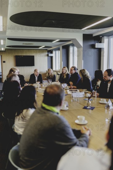 Olaf Scholz (SPD), Federal Chancellor, at a meeting with migrants and people involved in the field at SV Babelsberg in Potsdam, 26 February 2024