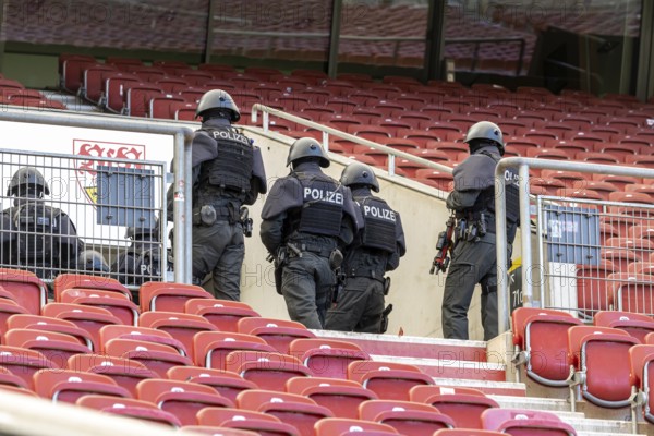 Baden-Württemberg police anti-terror exercise in the stadium. In the run-up to the European Football Championships, 1200 police officers rehearse for an emergency. Scenario: stabbing in the stands of the MHP Arena, VfB Stuttgart's stadium, which is also the venue for five European Championship matches. After initial treatment by the police, the handover of the injured to the emergency services and fire brigade was also rehearsed. Stuttgart, Baden-Württemberg, Germany, Europe