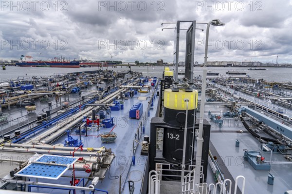 Inland tankers waiting for new cargo, in the petroleum harbour, seaport of Rotterdam, Maasvlakte, Rotterdam Netherlands