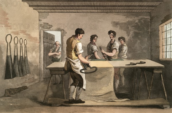 Scene from everyday life in England around 1810, The cloth dresser, tailor processing cloth, Historical, digitally restored reproduction from a 19th century original, Date unknown