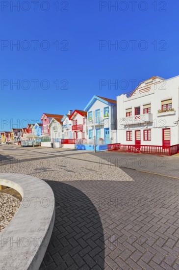 Brightly painted beach homes, Costa Nova do Prado, Aveiro, Portugal, Europe