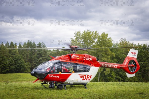 Winch rescue training of the rescue helicopter, Christoph 62, on the occasion of the 50th anniversary of the DRF Luftrettung. The rescue of casualties in the Elbe Sandstone Mountains will be practised