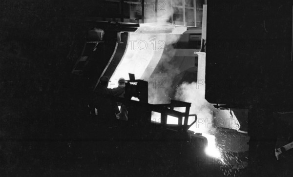 Steel production at the Hoesch AG steelworks in the Westfalenhuette on 4.12.1974 at the blast furnace and Siemens Martin furnace (SM) in Dortmund, Germany, Europe