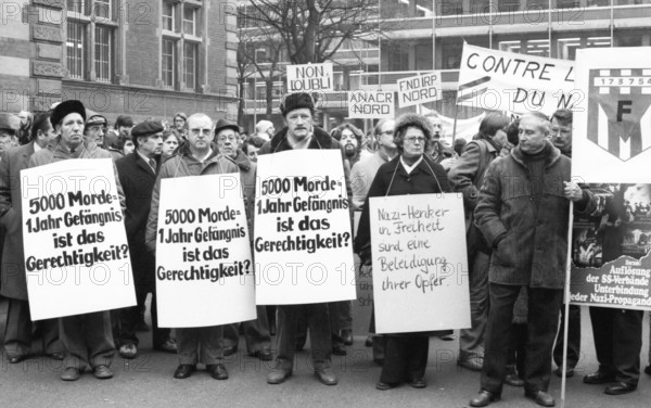 Organisations of French Jews and German Nazi victims demonstrated for a condemnation of Gestapo and SS man Kurt Lischka, who was responsible for the deportation of 76, 000 Jews in France during the war, in Cologne, Germany, 31 January 1980, Europe