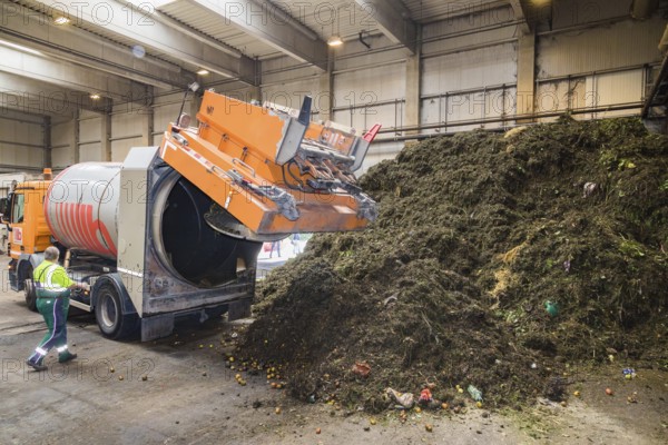 A disposal vehicle from the company Becker Umwelttechnik, delivers the contents of organic waste bins at the MVV biogas plant in Dresden to