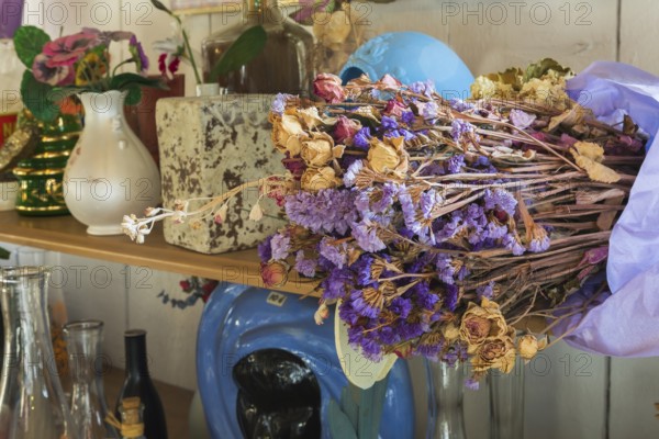 Dried flowers and curios for sale inside second hand goods and chattels store, Quebec, Canada, North America