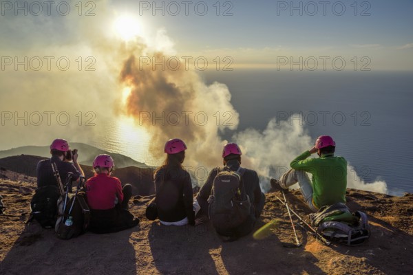 Tourists at the crater edge of the smoking layer volcano Stromboli, island Stromboli, Liparian Islands, Italy, Europe