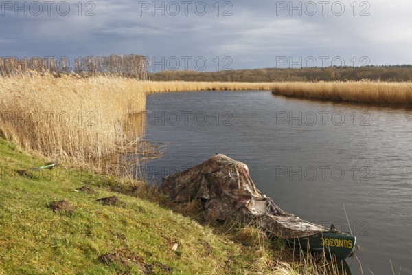 Nature park photographer's boat on the river Trebel, Peenetal River Landscape Nature Park, Mecklenburg-Western Pomerania, Germany, Europe