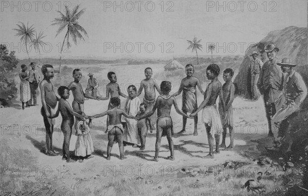 Negro children playing Ringelreihen in the German colony of Tanzania, 1880, Historic, digitally restored reproduction of an original 19th-century original