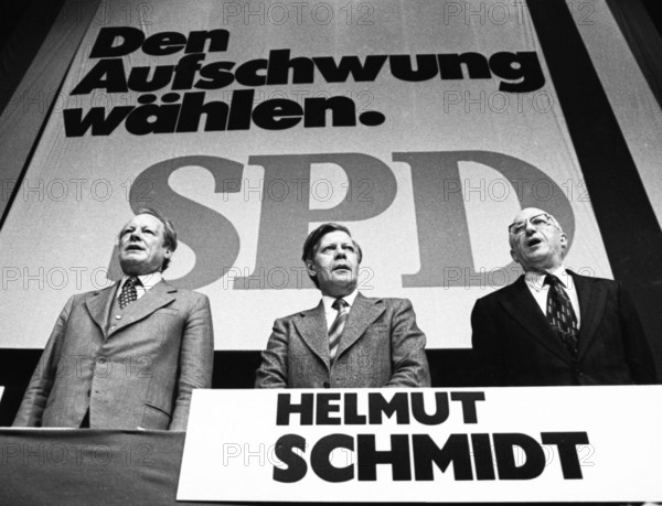 An election rally of the Social Democratic Party of Germany (SPD) on 23.4.1975 in the Westfalenhalle in Dortmund.Willy Brandt, Helmut Schmidt, Heinz Kuehn from left, Germany, Europe