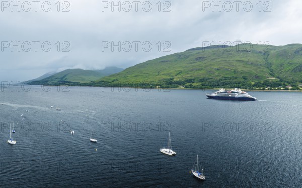 Luxury yacht and boats from a drone, Fort William, River Lochy, Lochaber, West Highlands, Scotland, UK