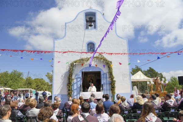 Open-air service in front of the Ermita de San Vicent chapel as part of the annual fiesta in honour of the saint of the same name in Cautivador or Captivador, La Nucía municipality, Alicante province, Valencia region, Costa Blanca, Spain, Europe