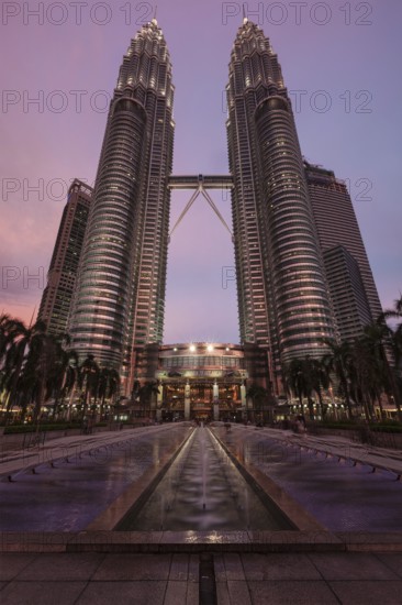 KUALA LUMPUR, MALAYSIA, MAY 5: Petronas Twin Towers in twilight on May 5, 2011 in Kuala Lumpur. They were the tallest building in the world 1998-2004 and remain the tallest twin building