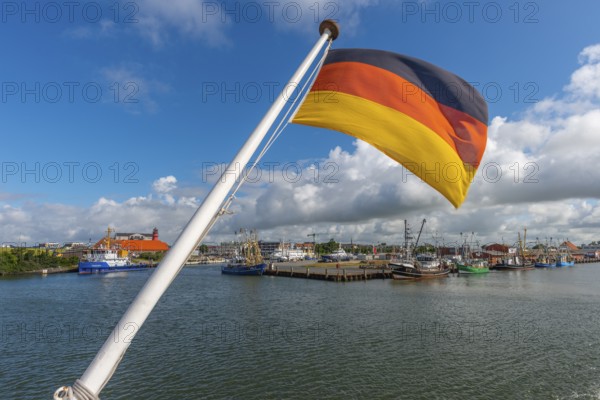 Büsum harbour, North Sea, German flag, fishing cutter, quay, Dithmarschen, Schleswig-Holstein, Germany, Europe