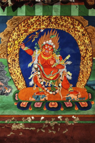 HEMIS, INDIA, SEPTEMBER 4, 2011: Wall painting of Dharmapala, Tibetan Buddhism wrathful protector deity. Hemis gompa (monastery), Ladakh, India, Asia