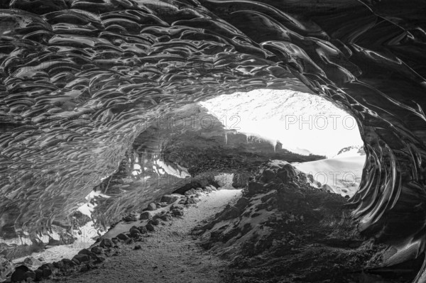 Filigree ice honeycombs at the entrance to the Pröng ice cave, black and white photo, Sudurland, Iceland, Europe