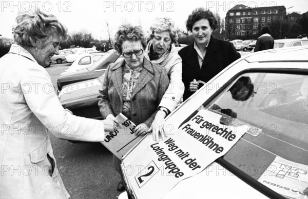 The IG Metall union used a motorcade to promote its demands for higher wages, co-determination, equal rights for woman and reforms on 13 February 1975 in Dortmund, Germany, Europe