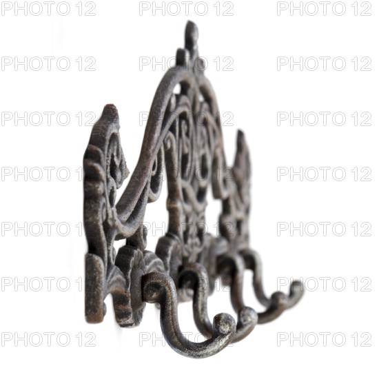 Antique metal hanger. Isolated picture