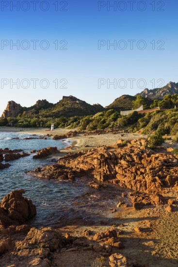 Lonely picturesque beach and red rocks, Spiaggia Su Sirboni, sunrise, near Tertenia, Province of Ogliastra, Sardinia, Italy, Europe