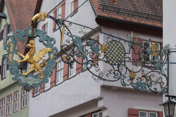 Historic nose sign from around 1900 at the former Gasthof Zum Greifen, Dr.-Martin-Luther-Straße 7, Dinklesbühl, Bavaria, Germany, Europe