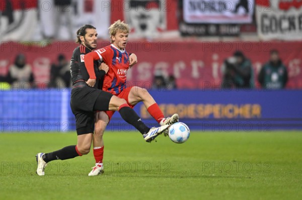 Duel, action Frans Krätzig 1. FC Heidenheim 1846 FCH (13) against Christopher Trimmel 1. FC Union Berlin FCU (28) Voith-Arena, Heidenheim, Baden-Württemberg, Germany, Europe