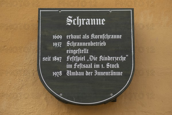 Information sign on the historic Schranne, built in 1609 as a granary, Weinmarkt 7, Dinkelsbühl, Bavaria, Germany, Europe