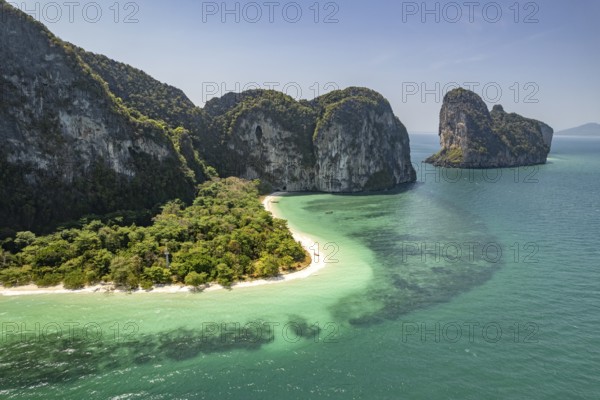 Steep karst cliffs and beach on the islands of Koh Lao Liang, Thailand, Asia